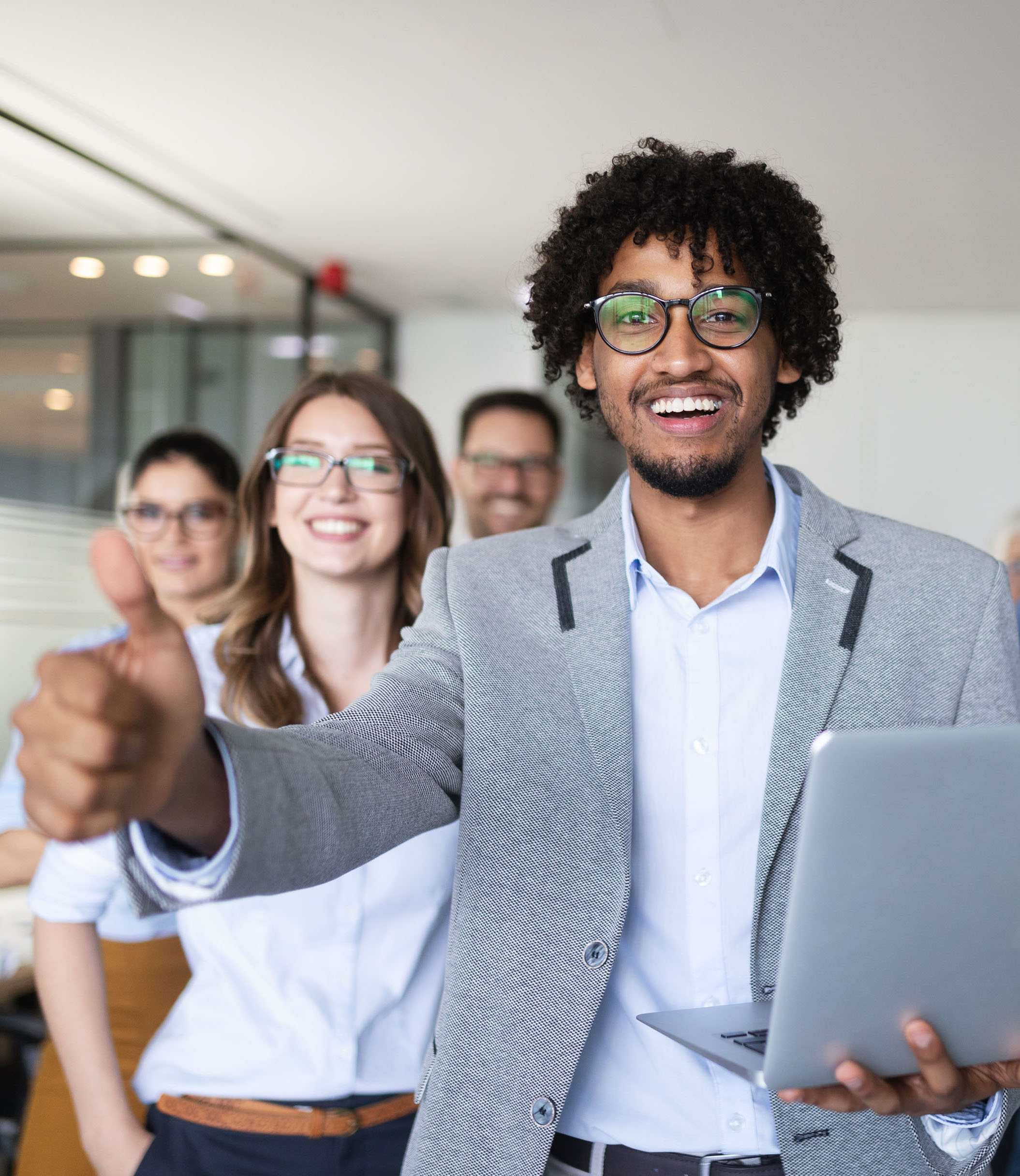 Successful company with happy workers in modern office